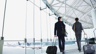 Business Travelers Walking