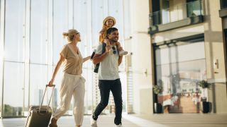 Family traveling in airport