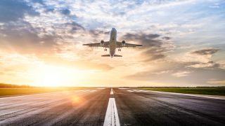 Airplane taking off runway