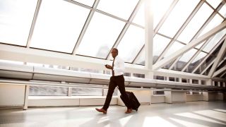 Business traveler walking