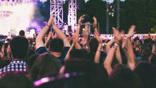 Concert Attendees Clapping