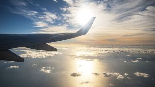 Image of Airplane tail in the sky during flight
