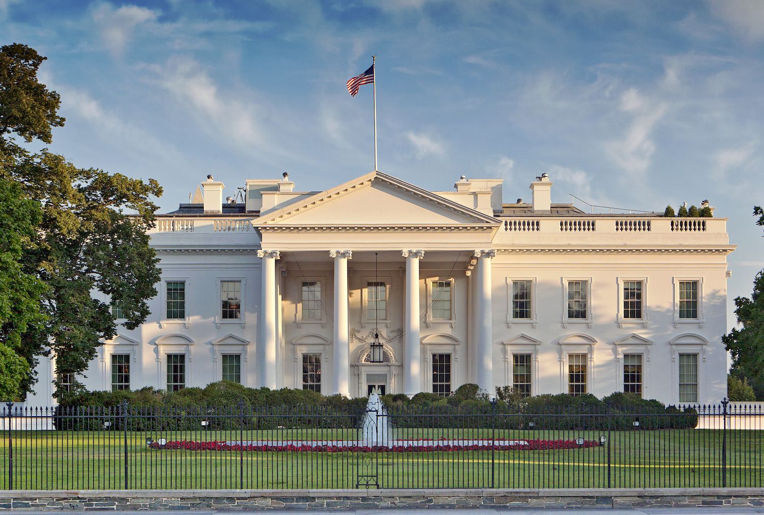 White House with U.S. Flag